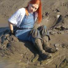DungeonMasterOne: Mud!  Rosemary wears dungarees, white t-shirt, and denim jacket in the mud