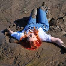 DungeonMasterOne: Mud!  Rosemary wears dungarees, white t-shirt, and denim jacket in the mud