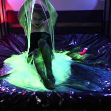 Stella: Stella fucks herself wearing Gothic lingerie in glo goo.