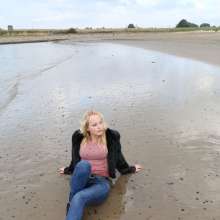eileenvogel: Eileen in the river in jeans and fluffy jacket