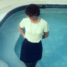 MadelineOasis: The Vibrant Kennedy in a Short Skirt, Pullover Top, and Heels in the Pool