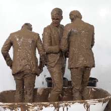 WamtasticUK: 3 Cute Guys in Smart Suits Pushed into Muddy Bath