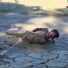 Jayce: Hogtied, Ball Gagged, Face Planting-Sinking in the Mud!