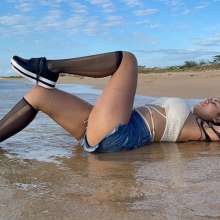 wet.look.me: Wetlook girl in shorts and short stockings get wet in beach | Wetlook.biz