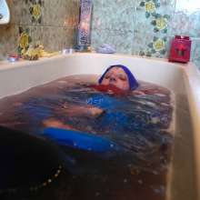 Ag Italian Wetlook: Ingrid fully-clothed in bathtub with old Stan Smith