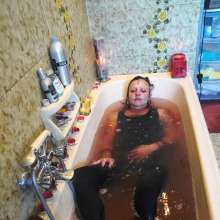 Ag Italian Wetlook: Ingrid fully-clothed in bathtub with old Stan Smith