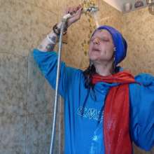 Ag Italian Wetlook: Ingrid fully-clothed in bathtub with old Stan Smith