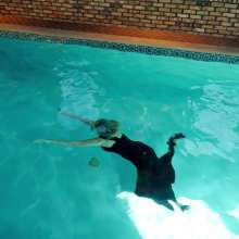WetlookFashion: Angel Swimming in a Shiny Black Evening Gown