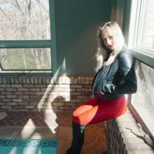 WetlookFashion: Camille in the Pool Wearing a Red and Black Leather Outfit