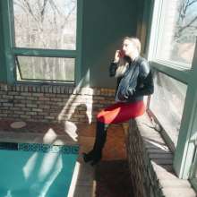 WetlookFashion: Camille in the Pool Wearing a Red and Black Leather Outfit