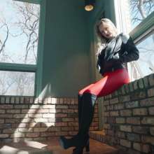WetlookFashion: Camille in the Pool Wearing a Red and Black Leather Outfit
