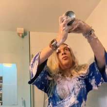 Kelly-Le-Frock: Foam and Wetlook play in the shower in a sexy dress