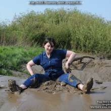 DungeonMasterOne: Rosemary takes a mudbath in a wide-leg denim jumpsuit and white trainers