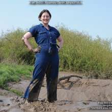 DungeonMasterOne: Rosemary takes a mudbath in a wide-leg denim jumpsuit and white trainers