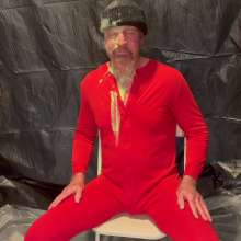 Musclestooge: A Onesie, a Beanie, and Pies