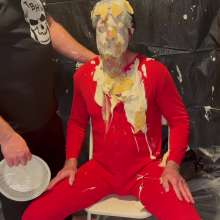 Musclestooge: A Onesie, a Beanie, and Pies