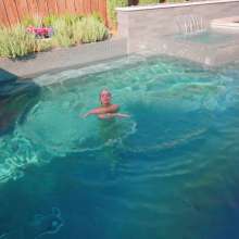 WetlookFashion: Casey Jumps in the Pool in a Sexy Green Pant Outfit