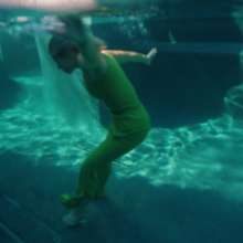 WetlookFashion: Casey Jumps in the Pool in a Sexy Green Pant Outfit