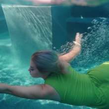 WetlookFashion: Casey Jumps in the Pool in a Sexy Green Pant Outfit