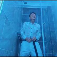 WETColours: Nico in the Shower Dressed in Total White