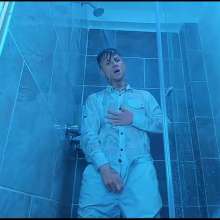 WETColours: Nico in the Shower Dressed in Total White