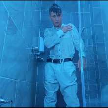 WETColours: Nico in the Shower Dressed in Total White