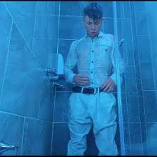 WETColours: Nico in the Shower Dressed in Total White