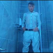 WETColours: Nico in the Shower Dressed in Total White