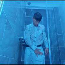WETColours: Nico in the Shower Dressed in Total White