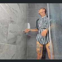 WETColours: Nico with the Football Shirt in the Shower