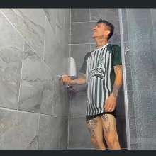 WETColours: Nico with the Football Shirt in the Shower