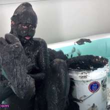 Messy Temptress: Naked and Nasty with Stinky Black Mud in an Inflatable Pool