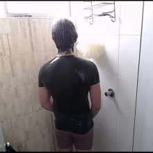 WETColours: Ross Shower and Shampoo Wearing a Green T-shirt