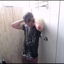 WETColours: Ross Shower and Shampoo Wearing a Green T-shirt