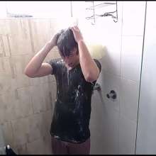 WETColours: Ross Shower and Shampoo Wearing a Green T-shirt
