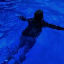 Wet Orchid: Wet Orchid Falls In Pool While Using The Skimmer