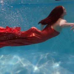 wetkahuna: Jenna in her orange gown