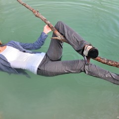 ufa217: Victoria in a business suit swims in the lake.