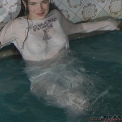 ufa217: Greta swims in the pool fully clothed. (video)