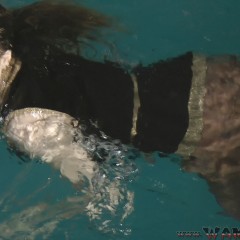 ufa217: Vanessa in a business suit swims in the pool. (video)
