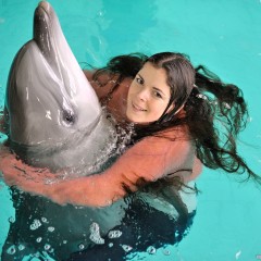 ufa217: Greta in jeans swims with dolphins.