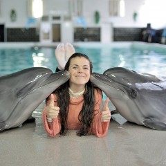 ufa217: Greta in jeans swims with dolphins.