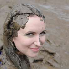 DungeonMasterOne: Mud!  Honeysuckle takes a river mudbath in a tight-fitting blue jumpsuit