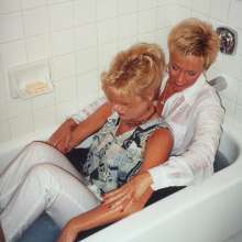 MadelineOasis: Best Friends in a Tub Wearing Jeans and Blouses Getting Each Other Soaked