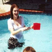 MadelineOasis: Two Cuties in Short Skirts and Tees Play, Splash, and Jump into the Pool