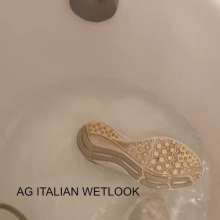 Ag Italian Wetlook: Alexandra fully-clothed in bathtub with white sneaker