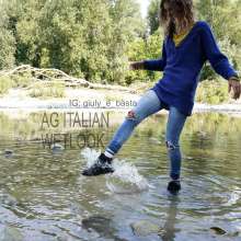 Ag Italian Wetlook: Giulia into the river with black Nike, white socks, jeans, blue sweater