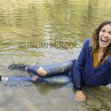 Ag Italian Wetlook: Giulia into the river with black Nike, white socks, jeans, blue sweater