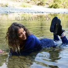 Ag Italian Wetlook: Giulia into the river with black Nike, white socks, jeans, blue sweater