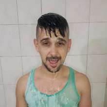 queeruy: Green Tank Top in Shower